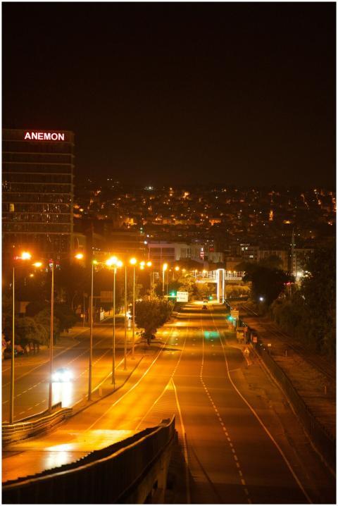 Calm cityscape of empty streets illuminated by str