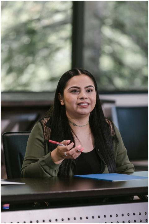 Confident woman speaking during a business meeting