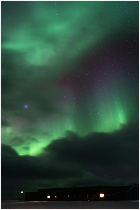 Capture of the vibrant aurora borealis and starry