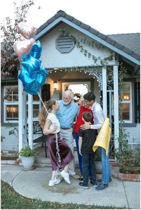 A joyous family celebration at home with balloons