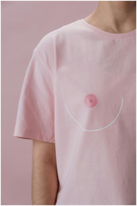 Close-up of a pink shirt highlighting breast cance