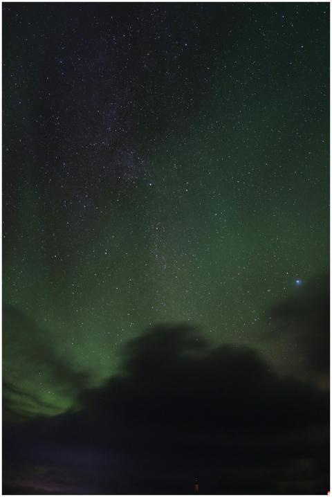A mesmerizing view of the starry night sky and aur