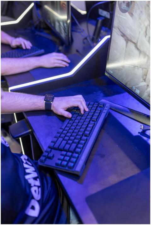 Close-up shot of a gaming setup with keyboard and
