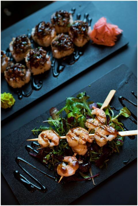 Delicious grilled shrimp skewers served with mixed