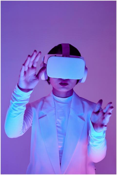 Woman in virtual reality headset interacting in a
