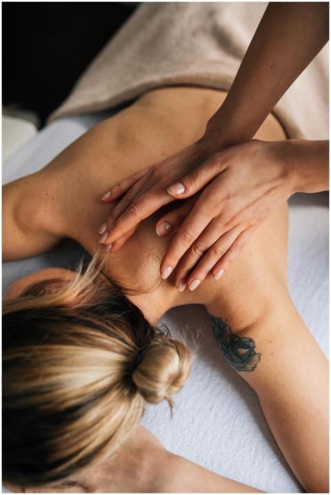 Female receiving a soothing massage in a tranquil
