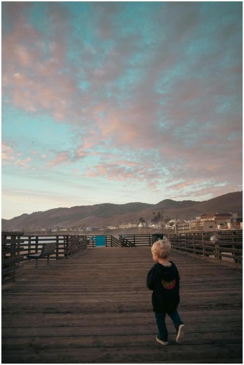 Child Walking Scenic Pier