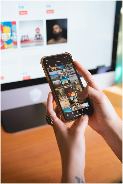 Close-up of a person browsing a smartphone with an