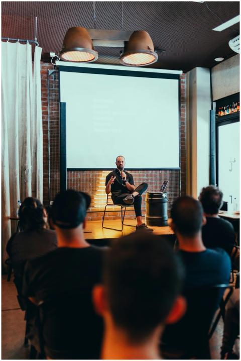 Speaker engages an audience during a business semi
