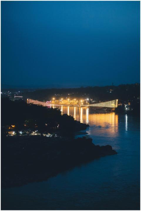 Beautiful night view of a suspension bridge over t