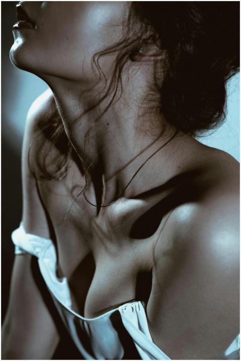 Elegant close-up of a woman's shoulder and neck wi