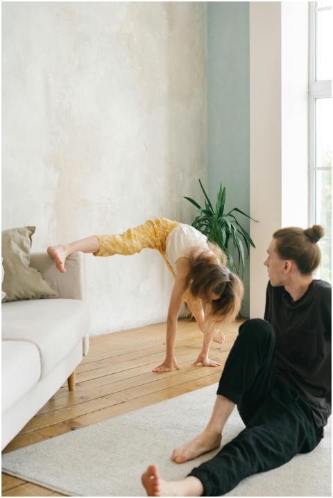 Father and daughter bonding through stretching exe