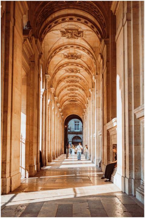 Elegant sunlit corridor with arches in Paris showc