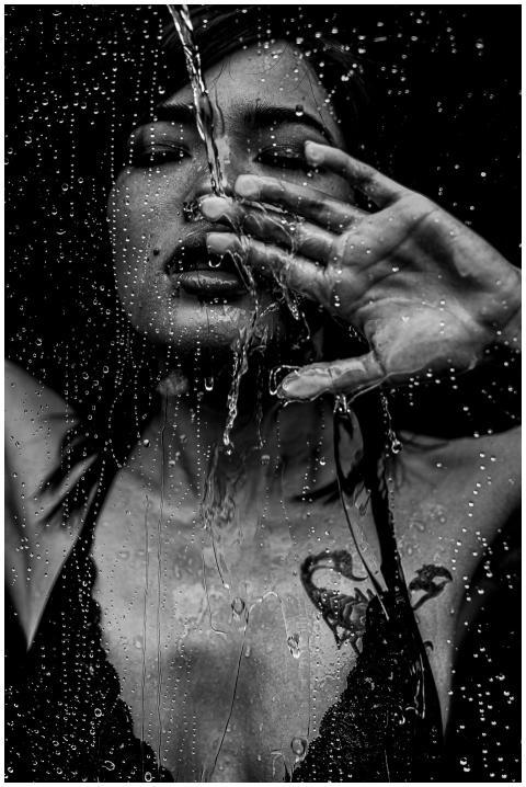 Emotive black and white portrait of a woman with w