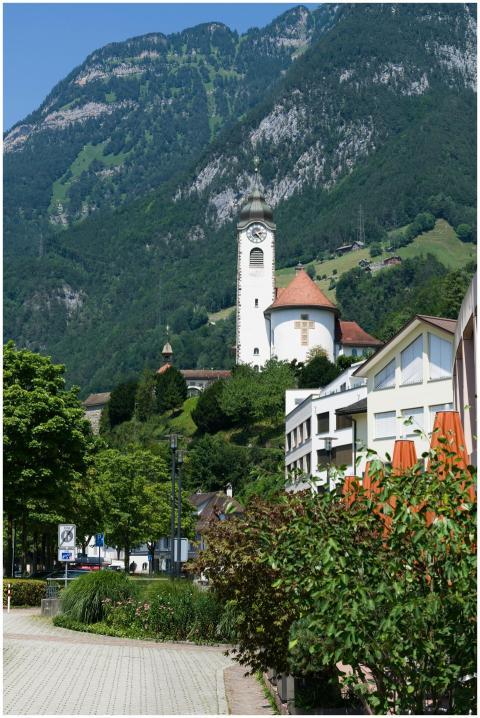 Charming Swiss village scene with church tower and
