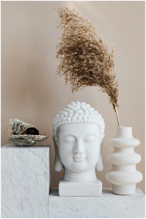Tranquil interior scene showcasing a Buddha bust w