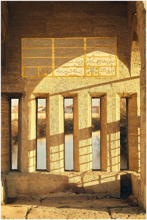 Ancient structure with intricate carvings and shad