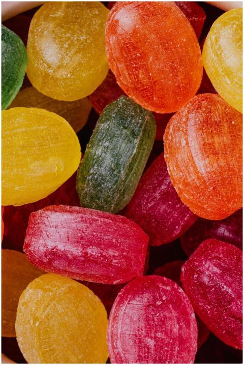 Closeup top view of multicolored bright lollipops