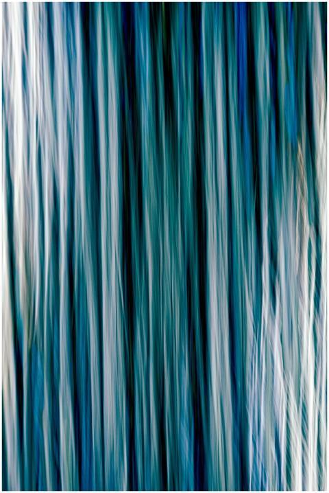 Ethereal abstract art with flowing blue vertical l