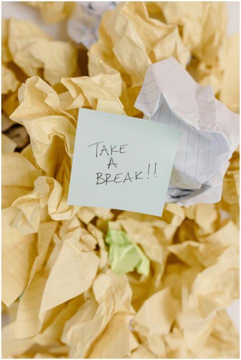 Sticky note with 'Take a Break' on crumpled paper