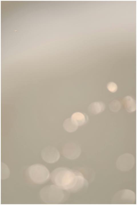 Soft abstract bokeh image featuring subtle light p