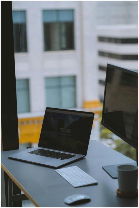 Modern opened laptop and computer with keyboard pl