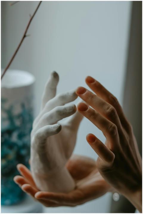 Elegant close-up of human hands interacting with a