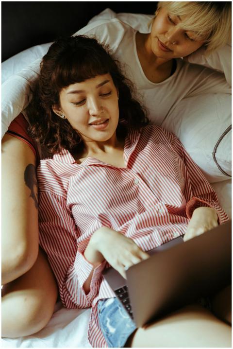 A young couple enjoying leisure time indoors, smil