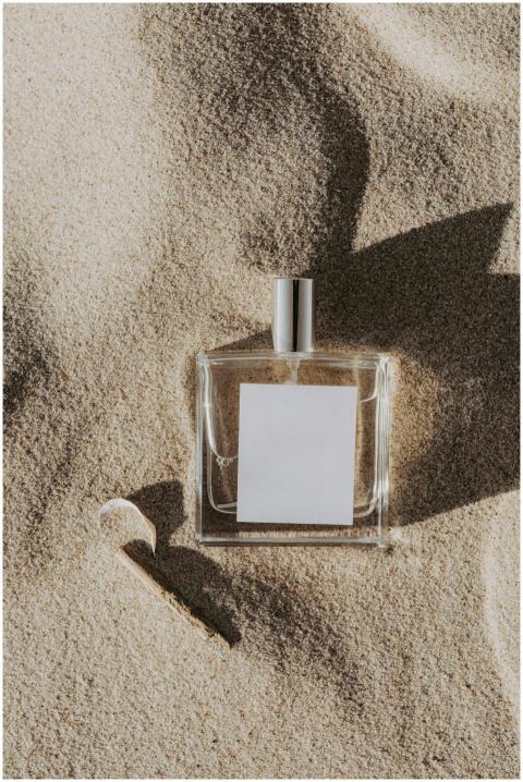 A minimalist perfume bottle with a blank label res