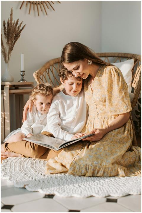 Warm scene of mother reading a book with her child