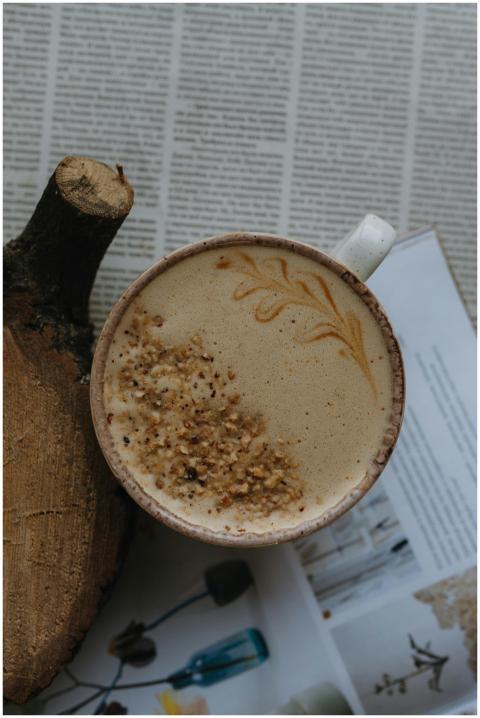 Cappuccino with artistic froth design and sprinkle
