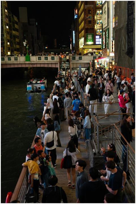 Crowds enjoy the bustling nightlife along Dotonbor