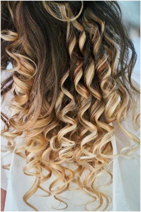 Close-up of elegant blonde curls showcasing detail