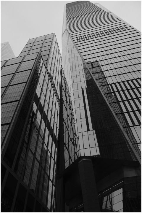 Black and white photo capturing towering skyscrape