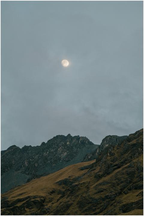 Stunning view of mountain peaks under the moonligh