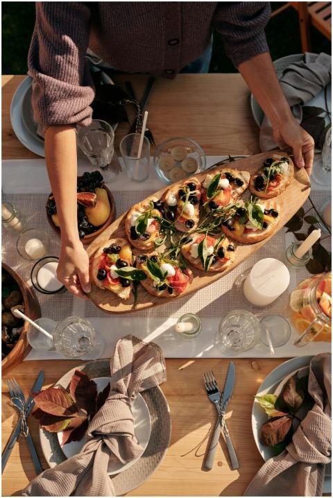 Top view of a gourmet dining table with elegant br