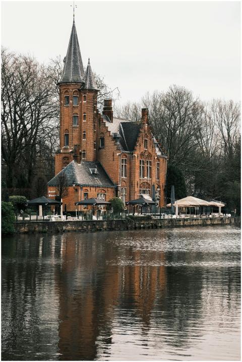 A picturesque Gothic-style castle reflecting in a