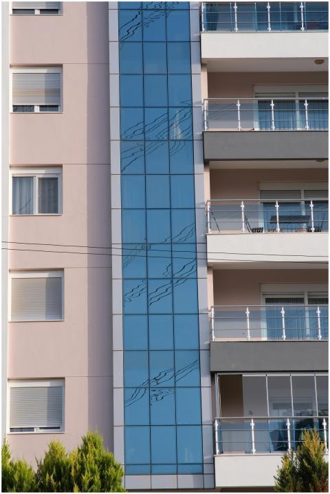 Close-up of a modern glass and concrete apartment