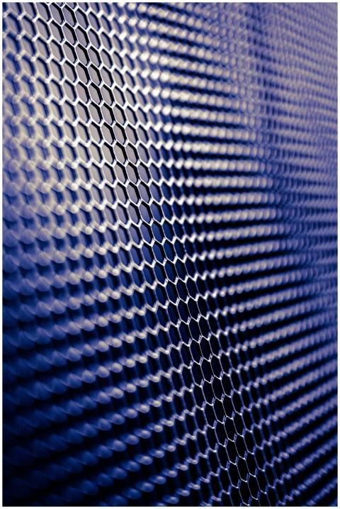 Close-up of a futuristic metallic hexagonal patter