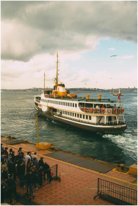 A scenic view of a ferry boat approaching Eminönü