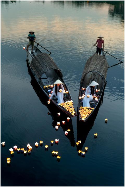 Scenic view of traditional lantern boats on the tr