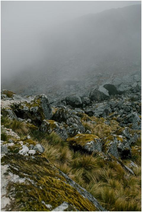 Foggy, tranquil landscape showcasing rocky terrain