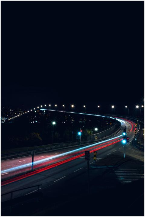 Stunning aerial shot of Tromsø at night showing ci
