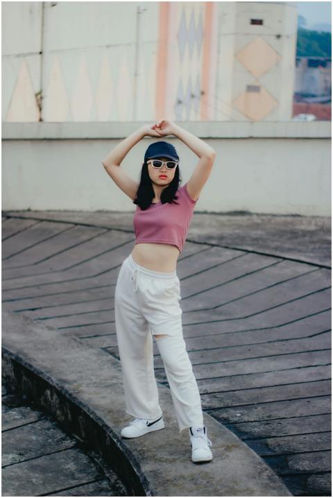 Young woman in urban setting wearing casual fashio