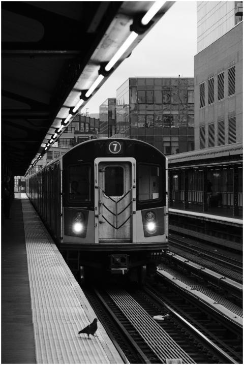 A classic black and white photo of a subway train