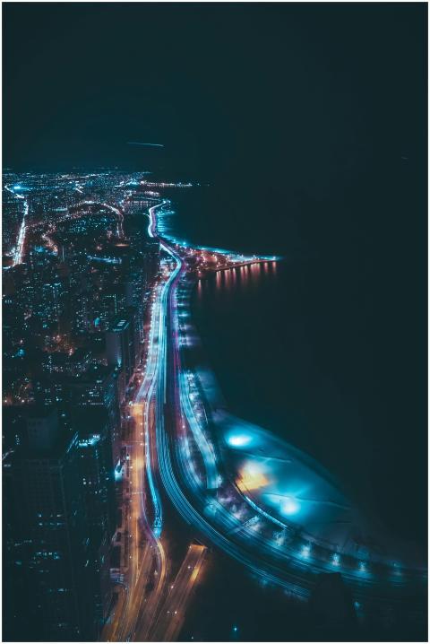 A stunning aerial view of Chicago's skyline at nig