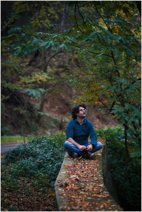 Man Relaxing Forest Path
