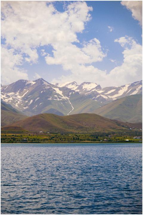 Stunning landscape of snow-capped mountains and la