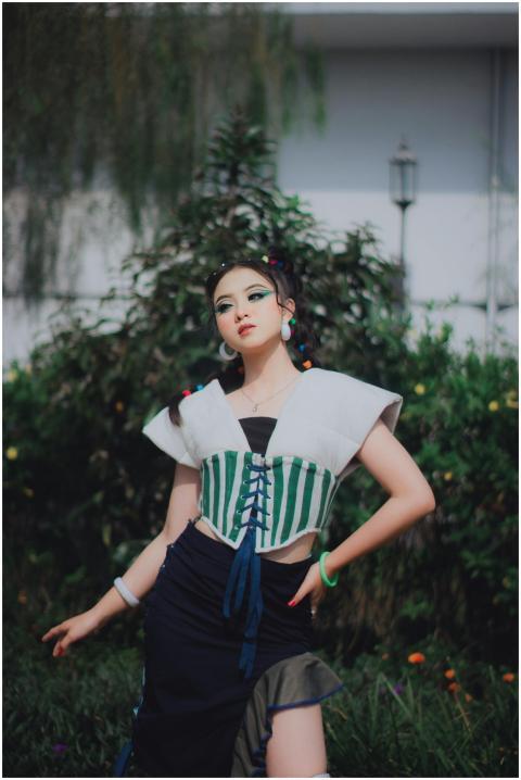 Fashionable portrait of a woman posing outdoors in