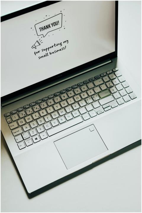 This close-up image shows a laptop displaying a th